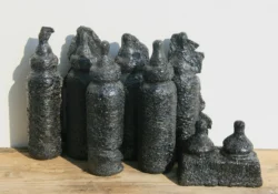 'Babies Bottles and Spare Teats', cast lava.19 x 5.5 x 5.5cms each. 2015. babies bottles and spare teats, cast lava. each 19 x 5.5 x 5.5cms. 2015.